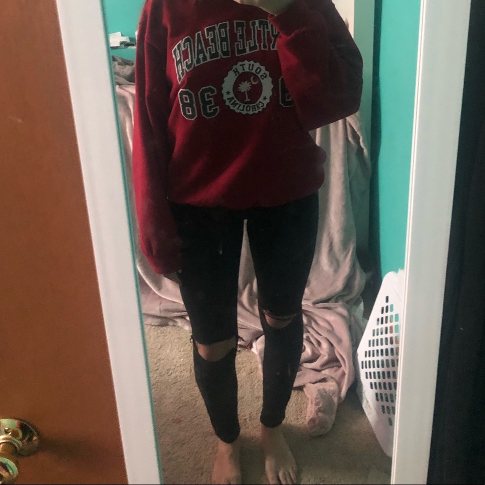 black ripped at the knee Garage jeans size 5